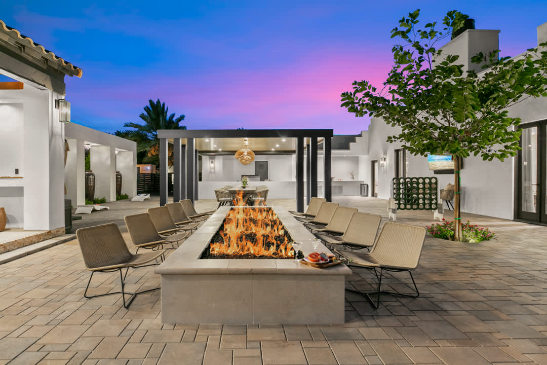 The Ranch firepit and pool at sunset