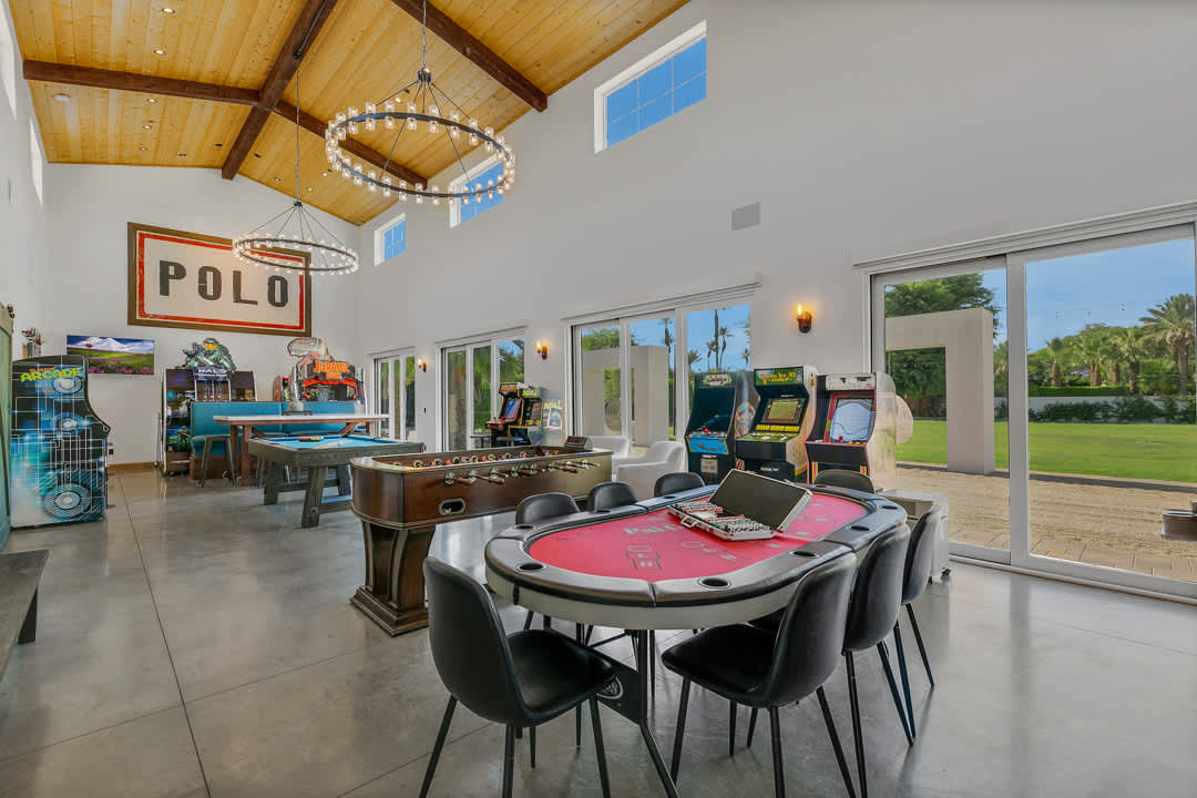 The Ranch game room with pool, poker, and arcade machines