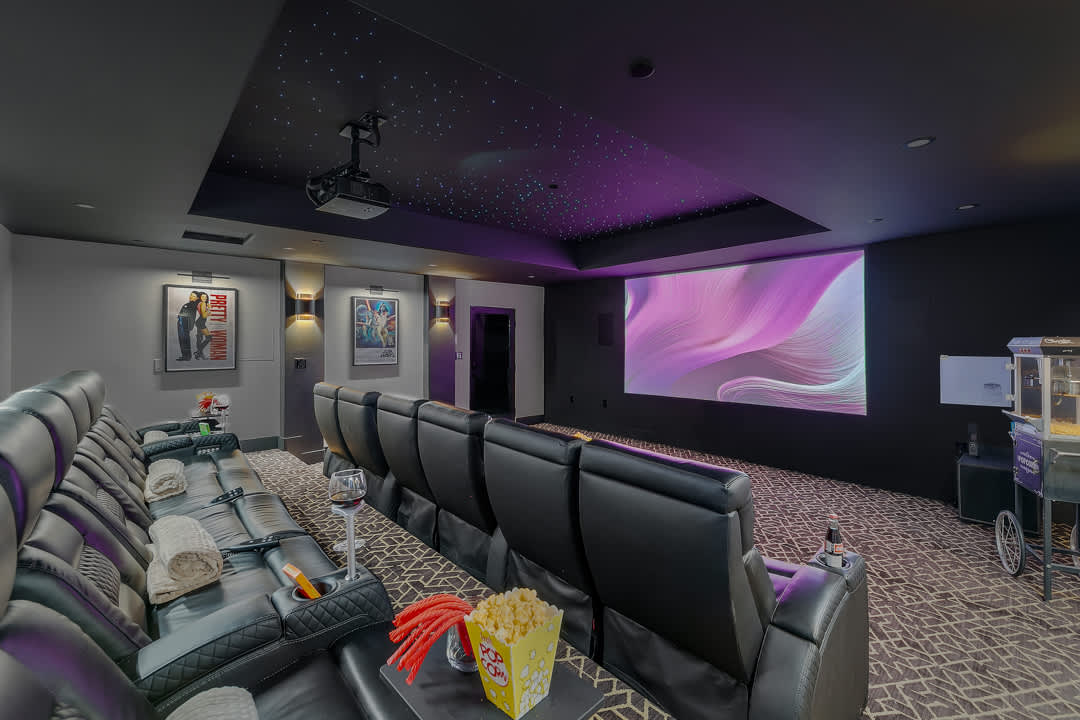 The private movie theater with rows of reclining seats